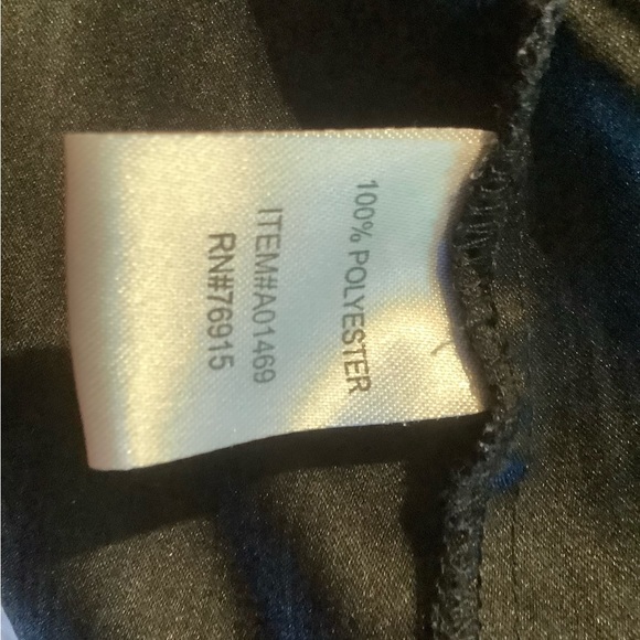 Koret black light-weight jacket with gold snaps up the front and on sleeve tabs. - Picture 5 of 6